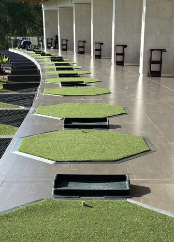 Close up of golf mats.